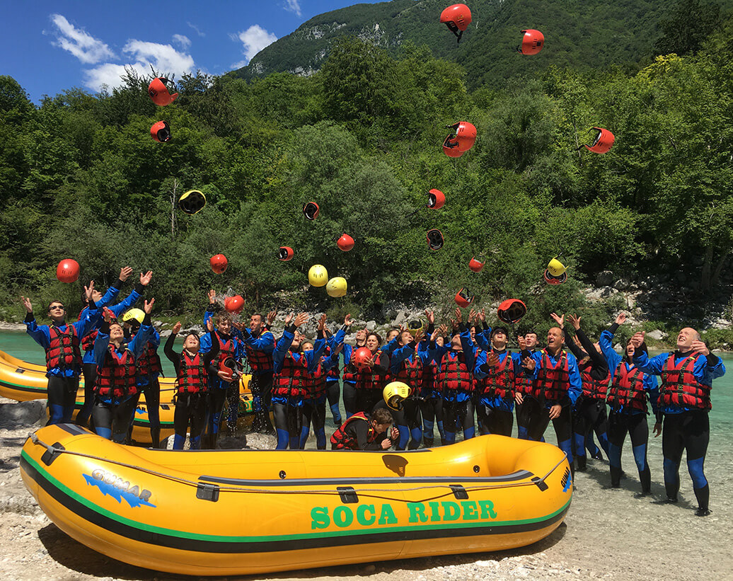 Whitewater rafting tour Bovec | People are enjoying rafting tour on Soča river, Bovec