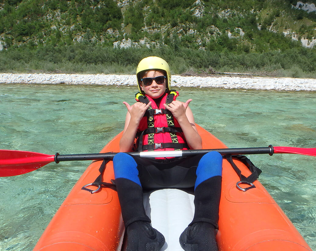 Whitewater kayaking Bovec, Soča, Slovenia | Kayaker is enjoying Soča river, Bovec