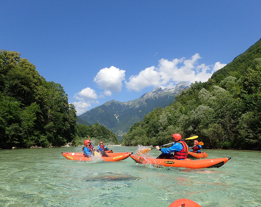 Have fun on the whitewater kayak tour, Soča river is the best to see from kayaks.